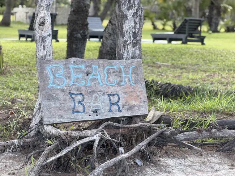 The hand-painted Beach Bar sign