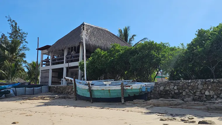 A thatched deck above the beach