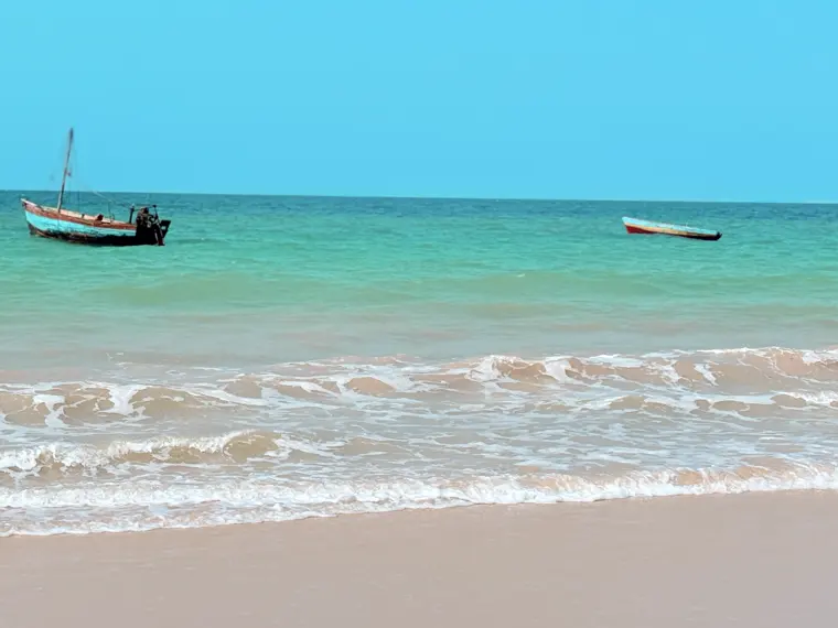 Dhows on the turquoise shallows