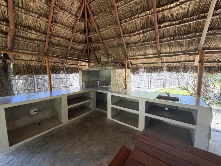 Kitchen counters under Stand Three's thatch