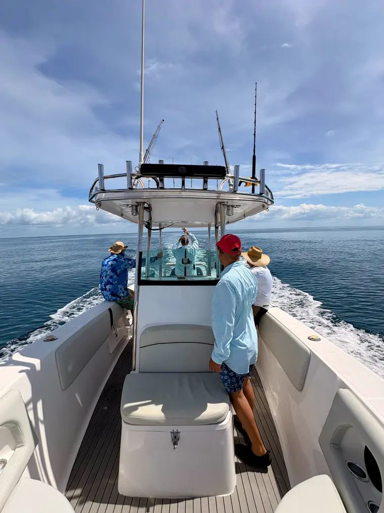Heading out over calm morning water