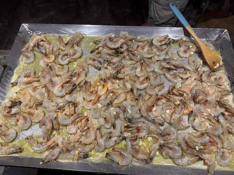 Prawns being prepped for the grill