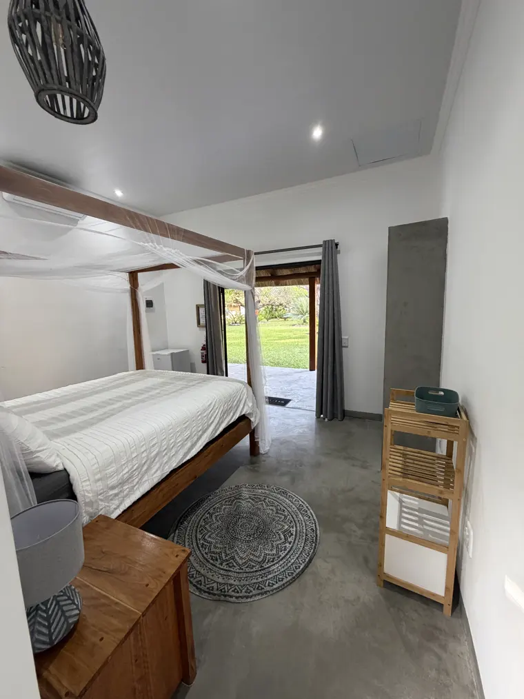 The bed in Room Two beside the garden door