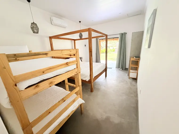 The bunks and four-poster in Room Four