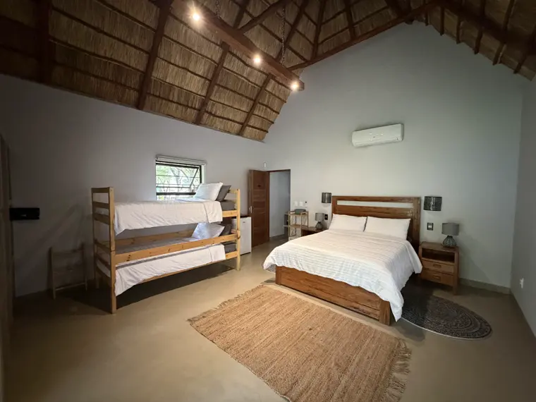Room Five with its double bed and bunks