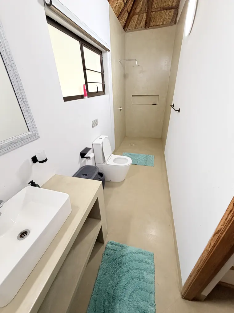 The bathroom in Room Five