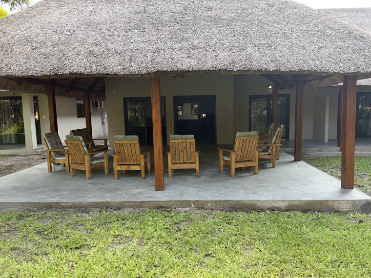 The veranda lounge with its wooden chairs