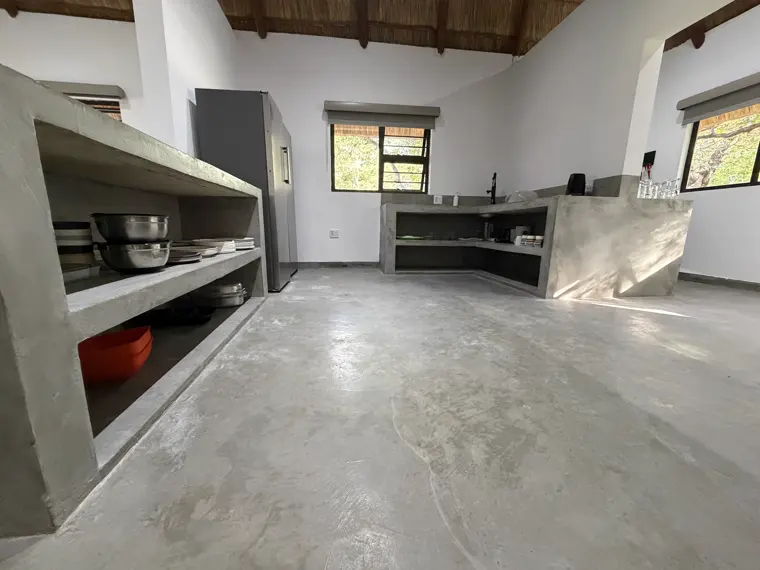 The kitchen counters and shelving