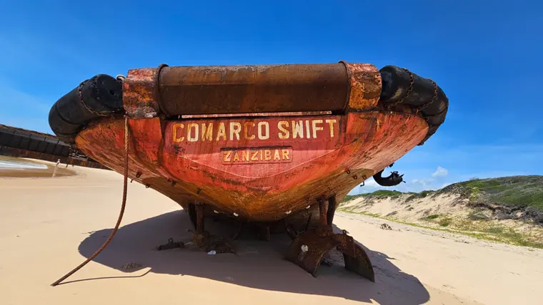 The painted stern of the old tug